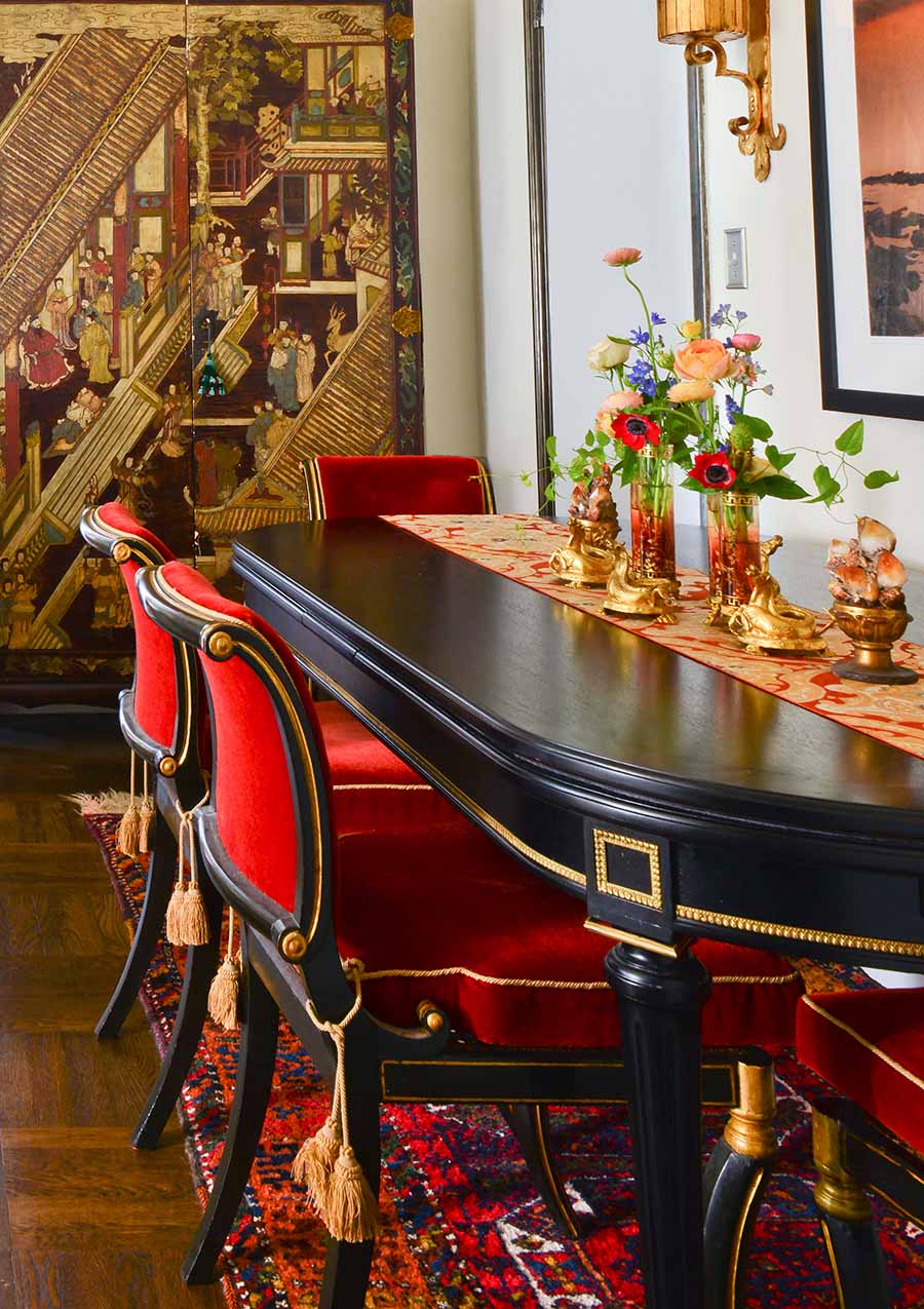 NY dining room asian art gold patina red velvet dark wood