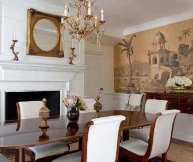 Traditional dining room with antique table and layered florals, Charleston interior design by Alexandra Howard